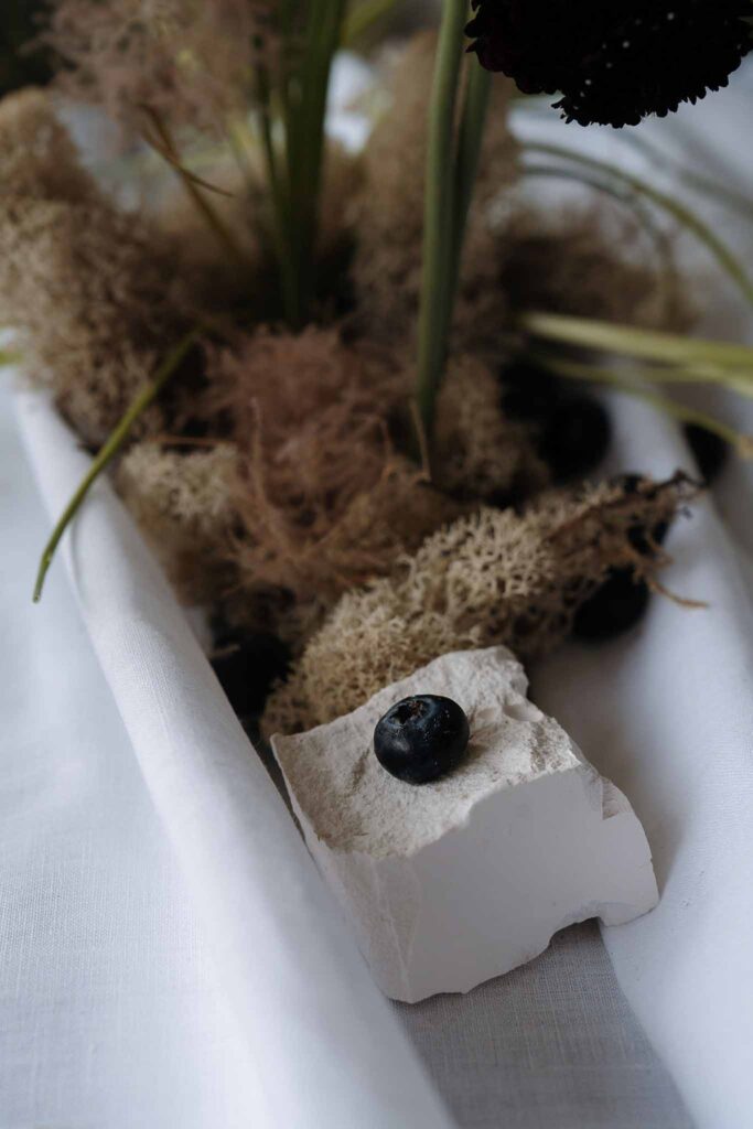 Domaine des Halles Camille Laurent detail shot flower candles centerpiece close up