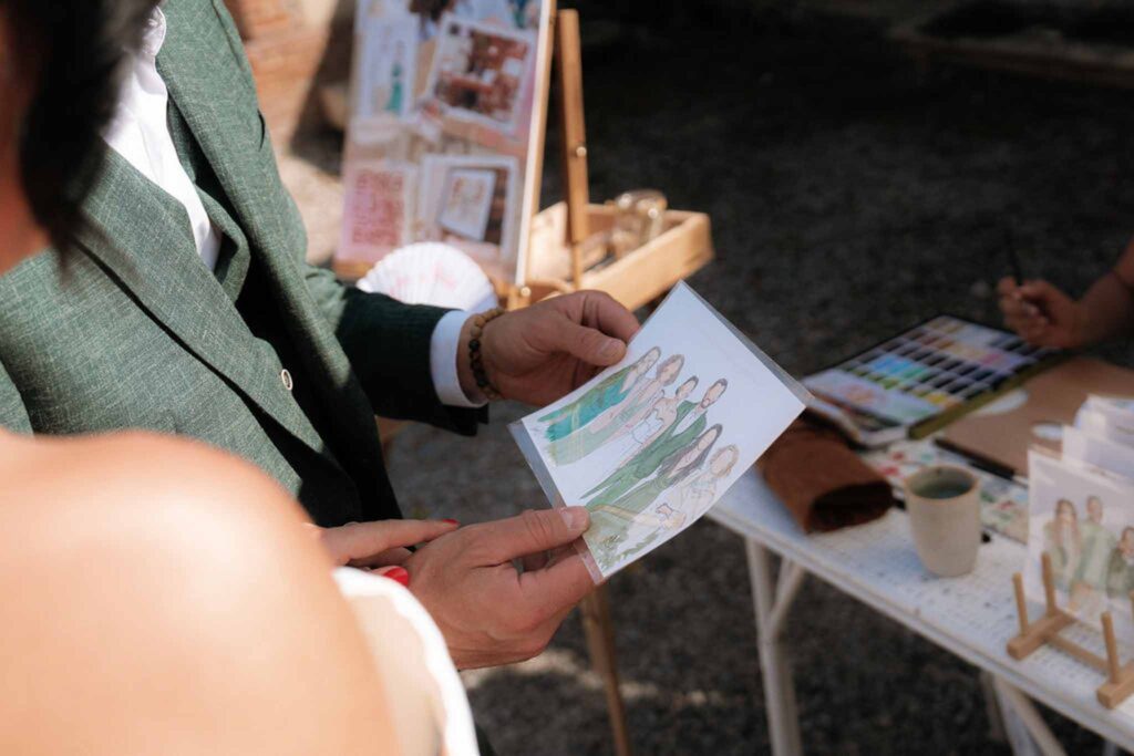 Chateau de Glairans Labricole groom holding painting live illustrator