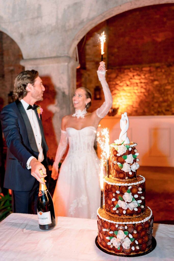 Domaine de Vignale Vincent Pennachio bride groom cake cutting sparkles night