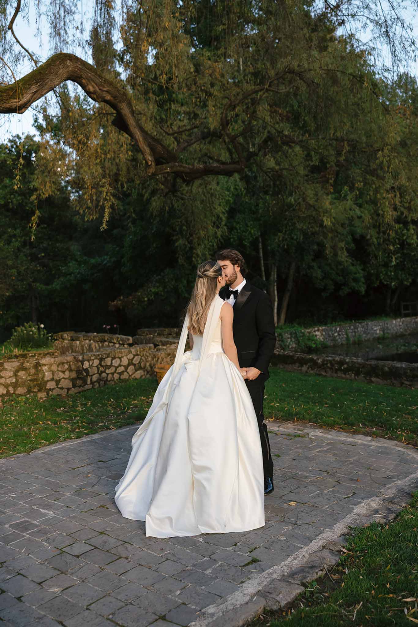 Bride and groom kissing