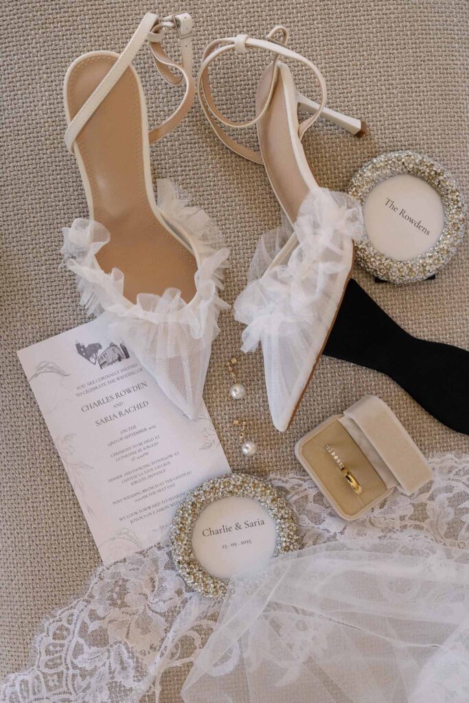 Tour Vaucros S.Rached flatlay accessories bride shoes invitation