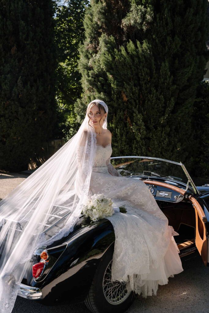 Tour Vaucros S.Rached golden hour bride sitting vintage car