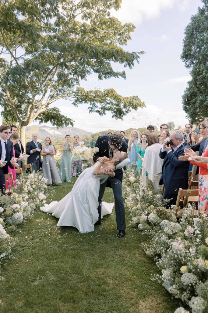 Maison Belzunce S.Castillo couple kiss ceremony aisle petal toss