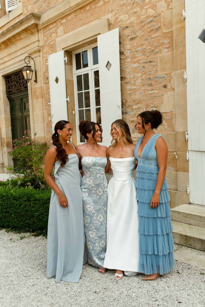 d Essendiéras K.Hiscox bridesmaids dress blue bride hug