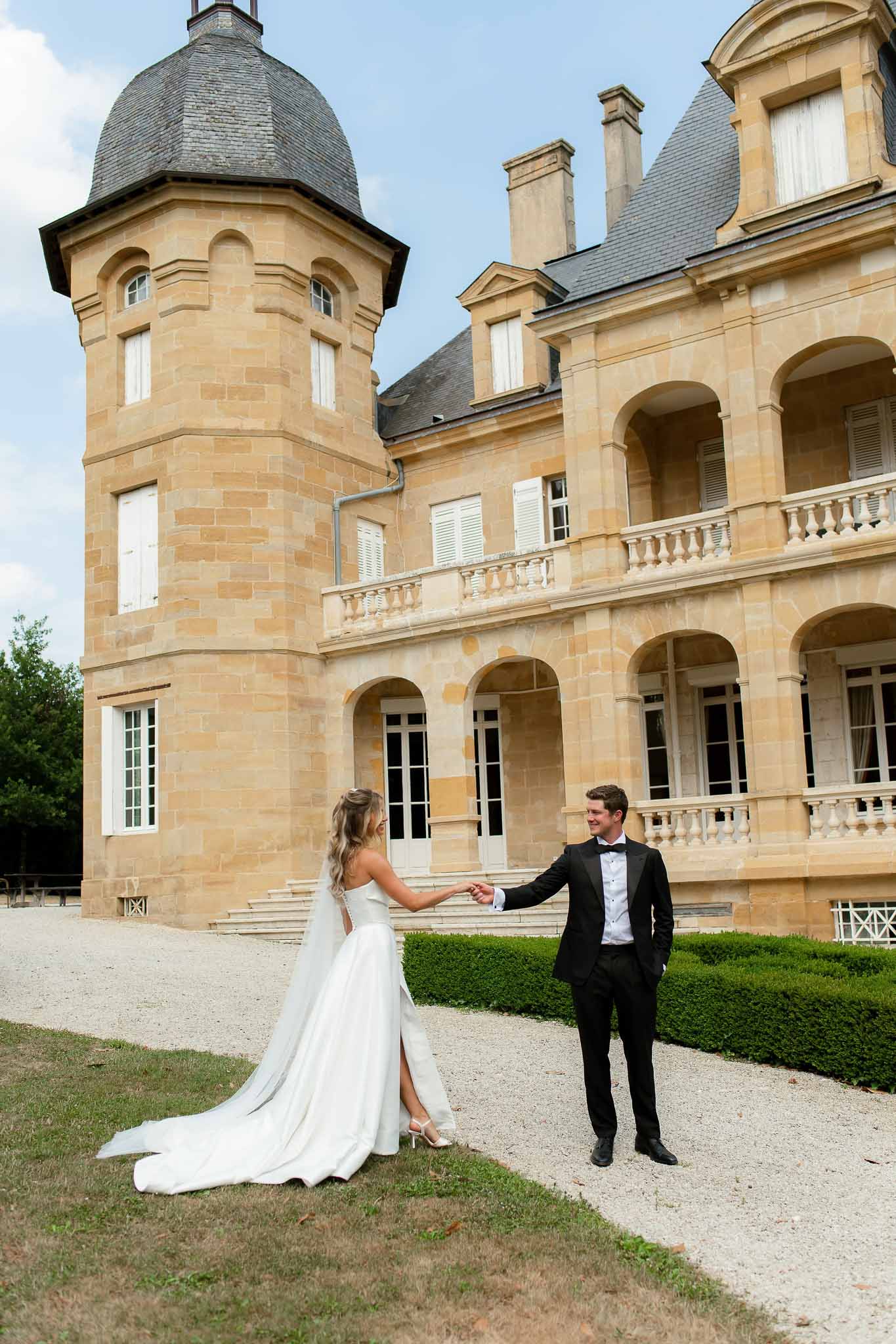 Bride and groom walking hand in hand
